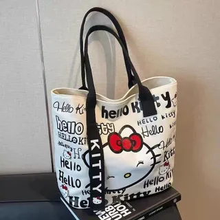 VINTLOOK Hellokitty กระเป๋าผ้าใบลายการ์ตูนกระเป๋าแฟชั่นผู้หญิงกระเป๋าถือน่ารักพร็อพแมทช์ลุคง่ายสะพายไหล่เดียวความจุขนาดใหญ่